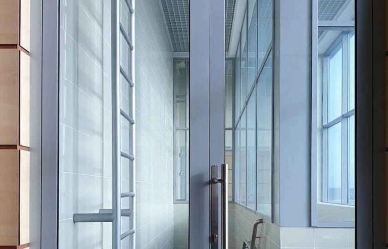 Fire door safety installation in a commercial corridor by A&H Hargreaves